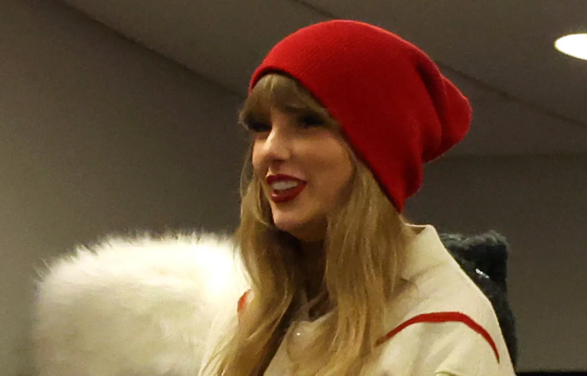 Taylor Swift watches the second quarter in the AFC Divisional Playoff game between the Kansas City Chiefs and the Buffalo Bills at Highmark Stadium in Orchard Park, N.Y., on Jan. 21, 2024. (Al Bello/Getty Images)