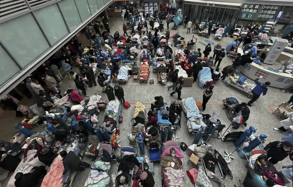 Patients on beds set up in the atrium area of a busy hospital in Shanghai, China, on Jan. 13, 2023. (Kevin Frayer/Getty Images)