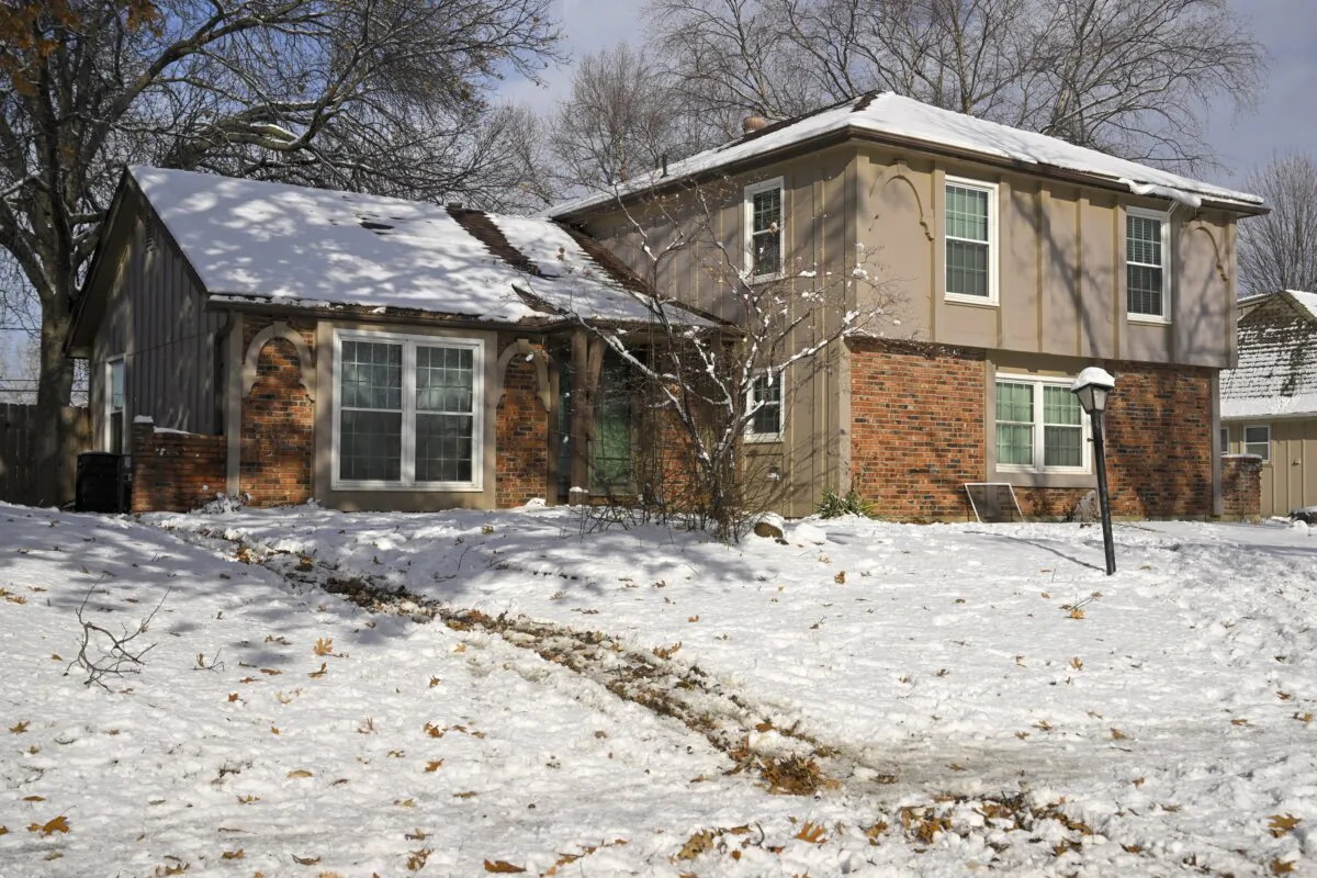 Three Kansas City Chiefs NFL football fans were found dead outside this home in Kansas City, Mo., on Jan. 9, 2024, as seen on Jan. 10. (Tammy Ljungblad/The Kansas City Star via AP)