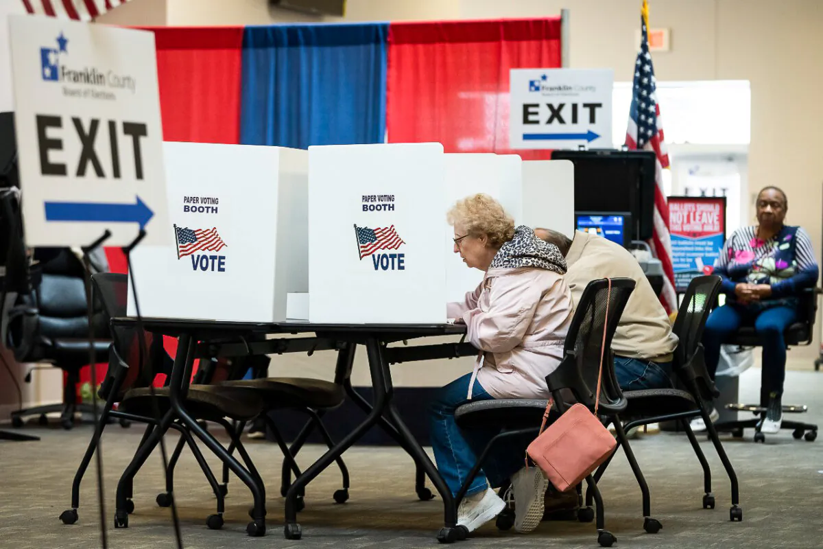 Voters use an optional paper ballot voting booth to cast their votes early before the May 3 primary at the Franklin County Board of Elections in Columbus, Ohio, on April 26, 2022. (Drew Angerer/Getty Images)