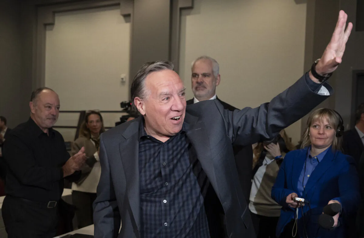 Quebec Premier Francois Legault arrives for the Coalition Avenir Quebec pre-sessional caucus in Sherbrooke, Quebec, on Jan. 24, 2024. (The Canadian Press/Christinne Muschi)