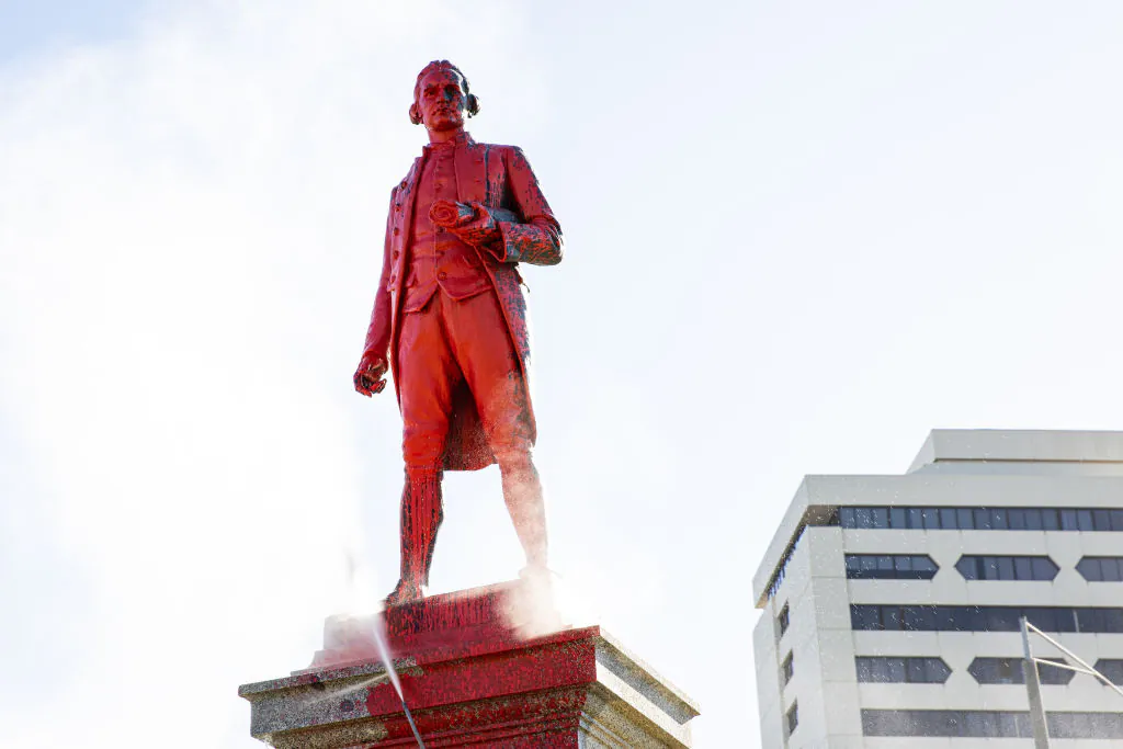Red paint covers a vandalised statue of Captain James Cook at Catani Gardens in St Kilda on Jan. 26, 2022 in Melbourne, Australia. (Diego Fedele/Getty Images)