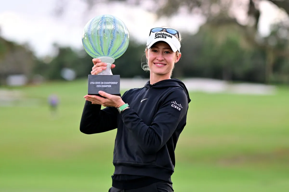 Nelly Korda of the United States poses with the championship trophy after a victory on the second play-off hole during the final round of the LPGA Drive On Championship in Bradenton, Fla., on Jan. 28, 2024. (Julio Aguilar/Getty Images)