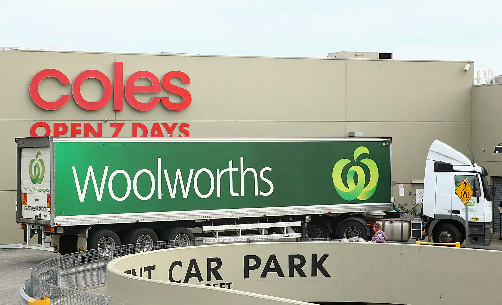 A Woolworths truck is parked outside a Coles supermarket in Melbourne, Australia, on May 25, 2015. (Quinn Rooney/Getty Images)