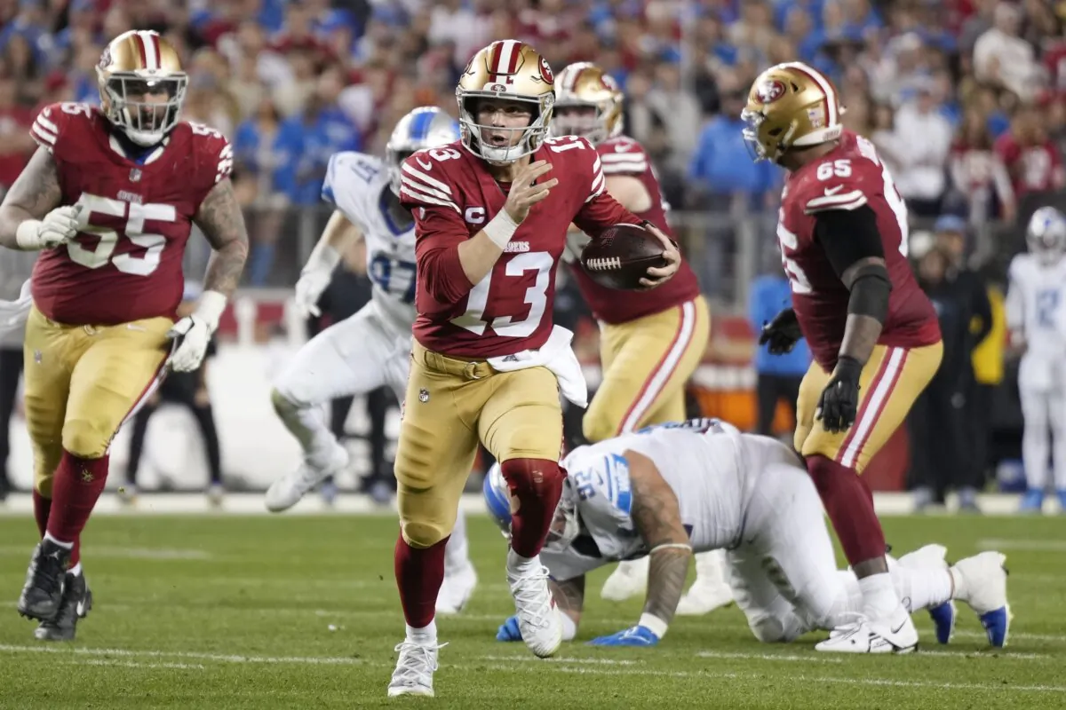 Brock Purdy (13) of the San Francisco 49ers runs the ball during the third quarter against the Detroit Lions in the NFC Championship Game in Santa Clara, Calif., on Jan. 28, 2024. (Thearon W. Henderson/Getty Images)