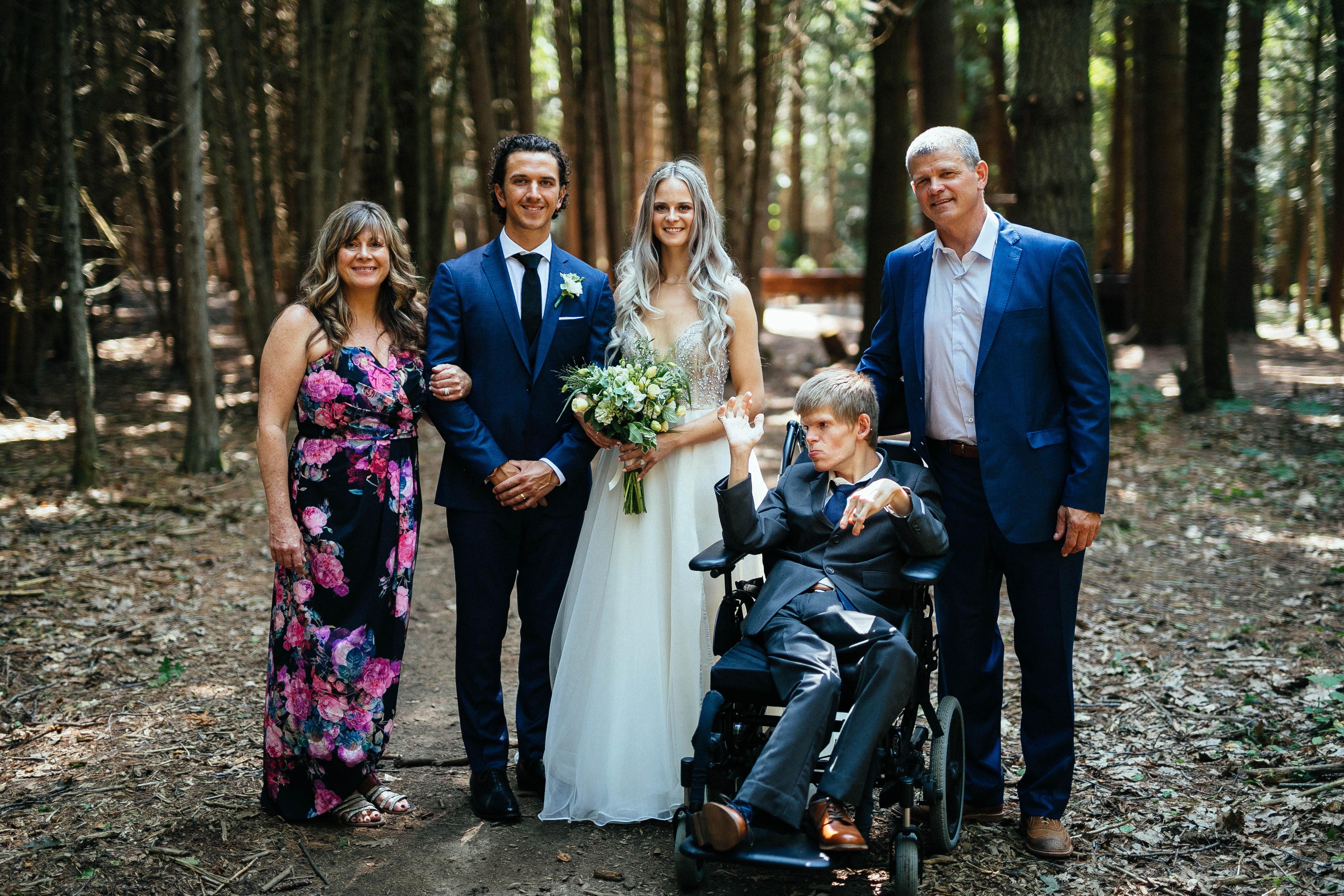 Mrs. Ashcroft with her husband and her family on her wedding day.