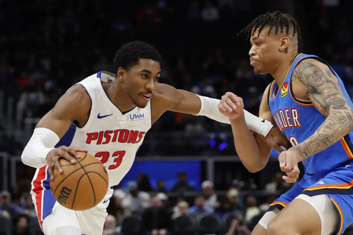 Detroit Pistons guard Jaden Ivey (23) dribbles defended by Oklahoma City Thunder forward Keyontae Johnson (18) in the second half at Little Caesars Arena in Detroit on Jan. 28, 2024. (Rick Osentoski/USA TODAY Sports via Field Level Media)