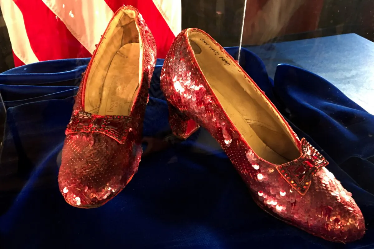 Ruby slippers once worn by Judy Garland in the "The Wizard of Oz" are displayed at a news conference at the FBI office in Brooklyn Center, Minn., on Sept. 4, 2018. (Jeff Baenen/AP Photo)