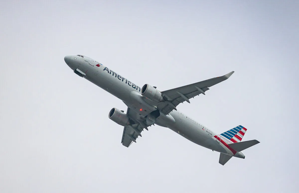 An American Airlines jet lands at John Wayne Airport in Santa Ana, Calif., on Dec. 27, 2023. (John Fredricks/The Epoch Times)