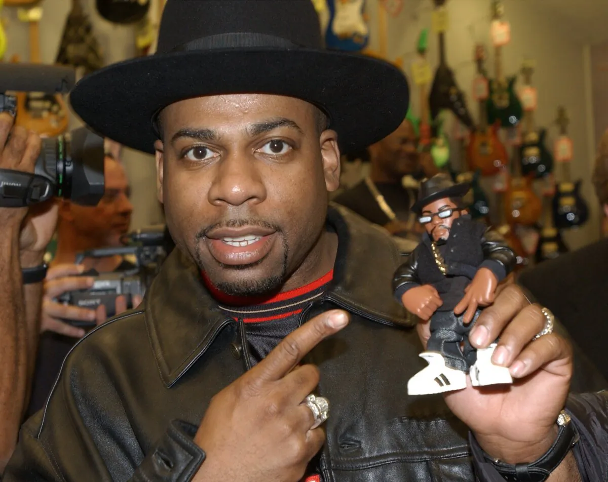 Musical artist Jason "Jam Master Jay" Mizell holds a toy figure of himself at a ceremony honoring his hip-hop group Run-DMC's induction into the Hollywood RockWalk at the Guitar Center in Hollywood, Calif., on Feb. 25, 2002. (Vince Bucci/Getty Images)