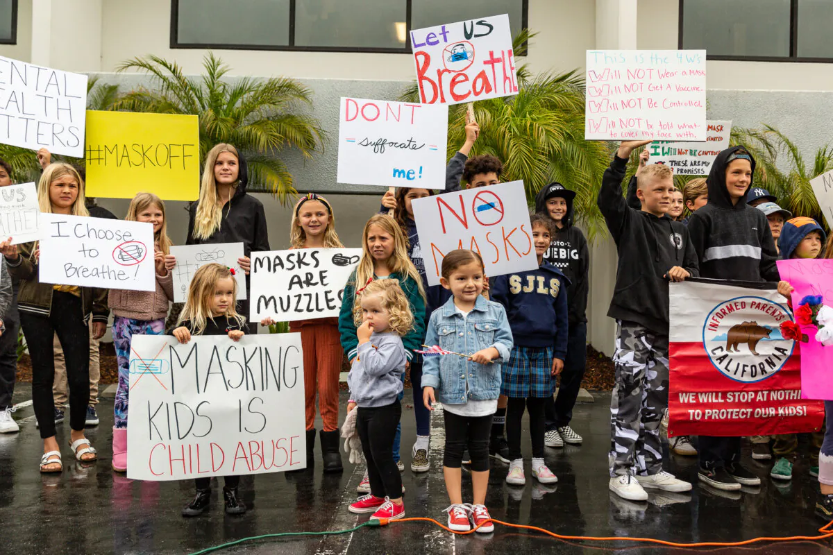 Parents and students during a protest in front of the Orange County Board of Education headquarters in Costa Mesa, Calif., on May 17, 2021. (John Fredricks/The Epoch Times)