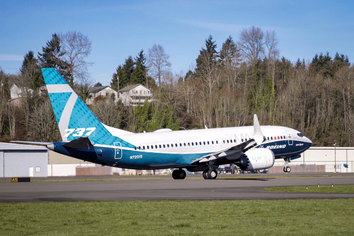 A Boeing 737 MAX 7 takes off on its first flight in Renton, Wash., on March 16, 2018. (Jason Redmond/AP Photo)