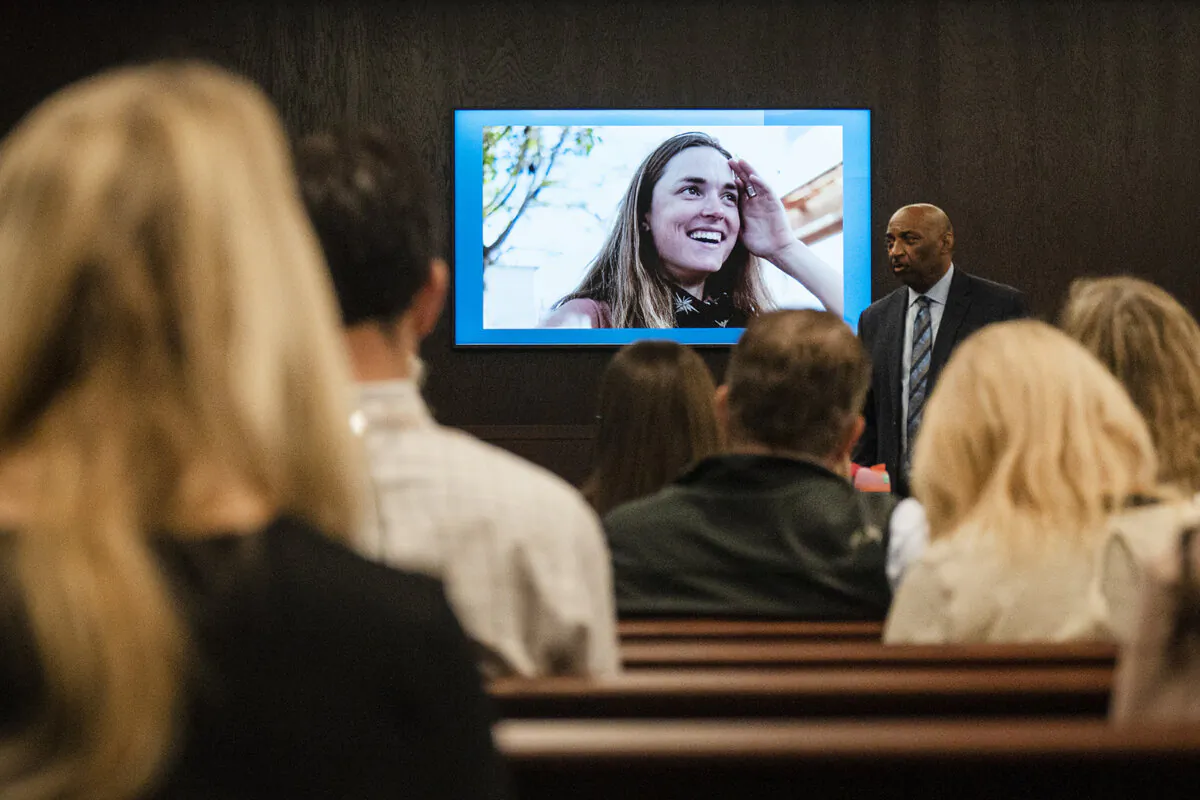 Anna Moriah Wilson's photo is displayed on the screen as state attorney Rickey Jones addresses the jury during the sentencing portion of Kaitlin Armstrong's murder trial at the Blackwell-Thurman Criminal Justice Center in Austin, Texas, on Nov. 17, 2023. (Mikala Compton/Austin American-Statesman via AP, Pool)