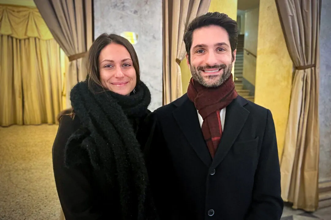 Attilio Massa and his wife Laura Gadducci at the Shen Yun Performing Arts performance at the Teatro Regio in Parma on January 25, 2024,(Leo Botna/The Epoch Times)