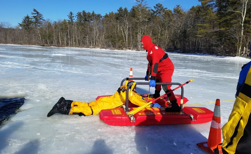 Denmark first responders practice using the ice rescue sled. (Courtesy of Denmark Fire Department)
