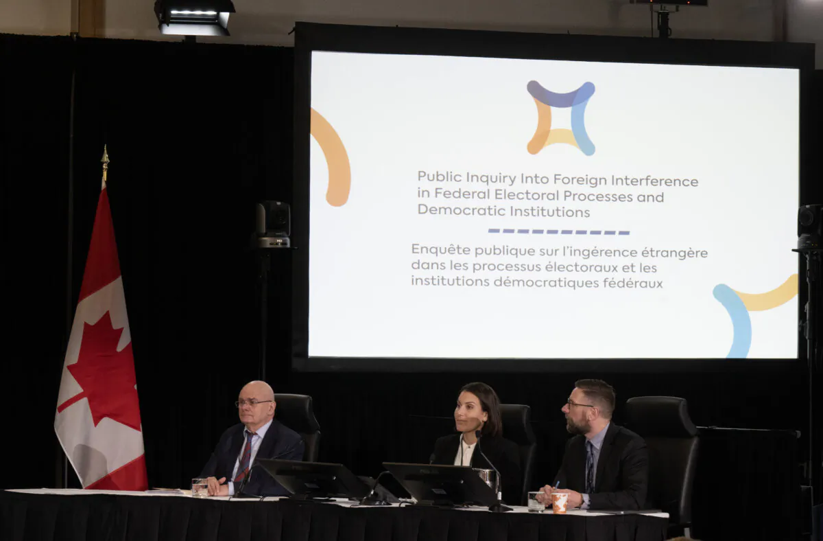 (L-R) University of Montreal professor Pierre Trudel, Carleton University professor Leah West and University of Calgary professor Michael Nesbitt are seen during a panel discussion at the Public Inquiry Into Foreign Interference in Federal Electoral Processes and Democratic Institutions  in Ottawa on Jan. 30, 2024. (Adrian Wyld/The Canadian Press)