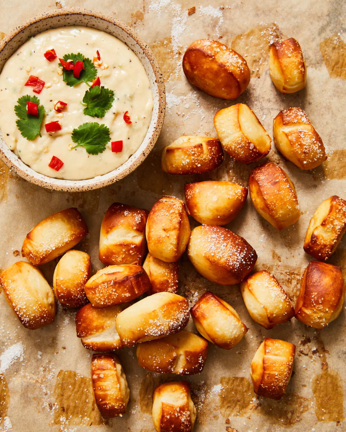 Everyone will enjoy extremely snackable mini pretzel bites complete with a hot cheesy dip. (Linda Xiao/TNS)