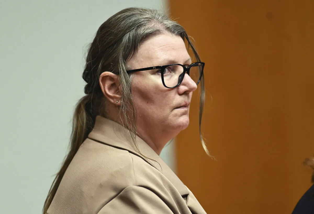 Defendant Jennifer Crumbley listens to witness testimony during her jury trial at Oakland County Courthouse, Tuesday, Jan. 30, 2024, in Pontiac, Mich. Crumbley, 45, is charged with involuntary manslaughter. Prosecutors say she and her husband were grossly negligent and could have prevented the four deaths if they had tended to their son’s mental health. They’re also accused of making a gun accessible at home. (Clarence Tabb Jr./Detroit News via AP)