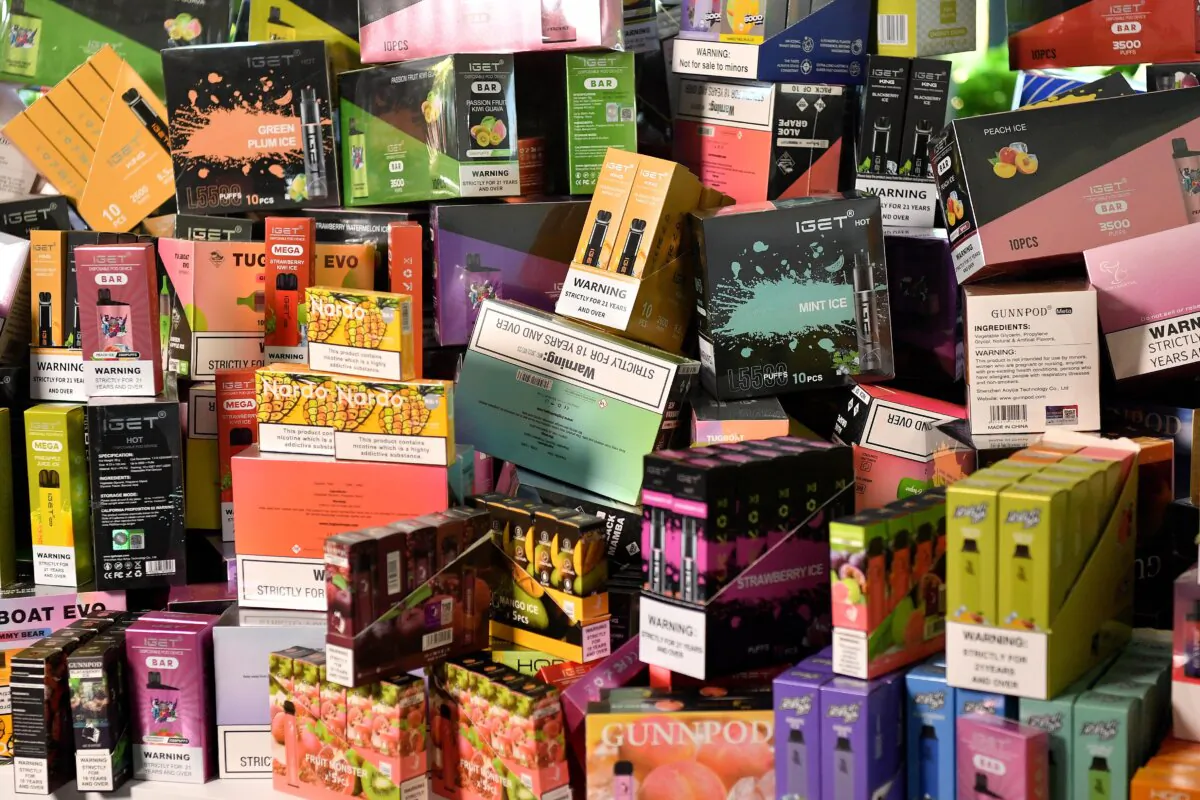 Illegal vapes are displayed during a press conference on illegal vape imports in Sydney, Australia, on Sept. 25, 2023. (AAP Image/Bianca De Marchi) 