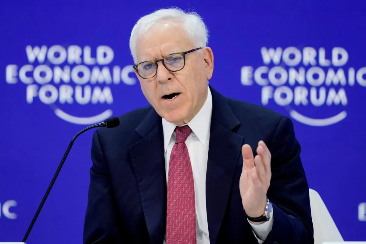 Co-founder and co-chairman of the private equity firm The Carlyle Group David Rubenstein speaks in the panel "The Global Economic Outlook" on the last day of the World Economic Forum's Annual Meeting in Davos, Switzerland, on Jan. 19, 2024. (Markus Schreiber/AP Photo)