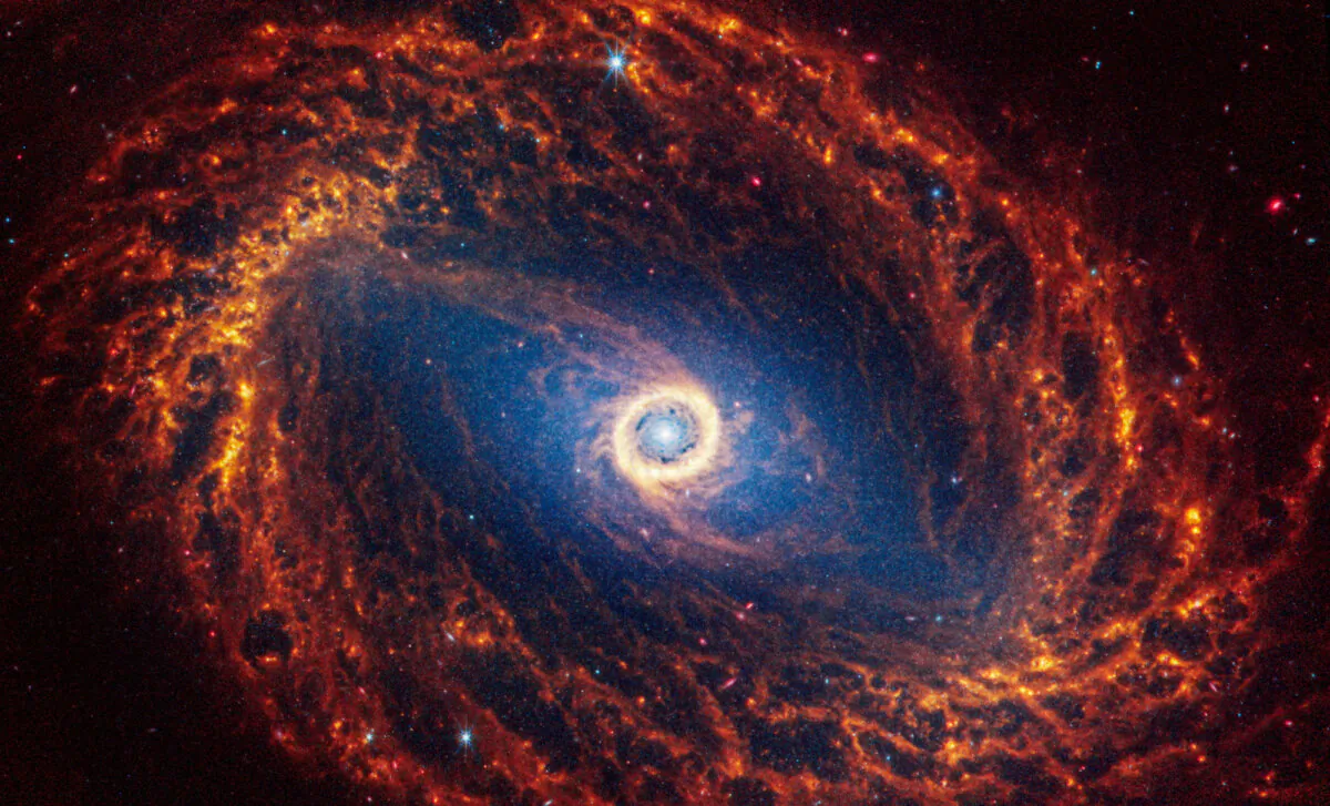 Spiral galaxy NGC 1512, located 30 million light-years away from Earth, is seen in an undated image from the James Webb Space Telescope. (NASA, ESA, CSA, STScI, Janice Lee (STScI), Thomas Williams (Oxford), and the PHANGS team/Handout via Reuters)