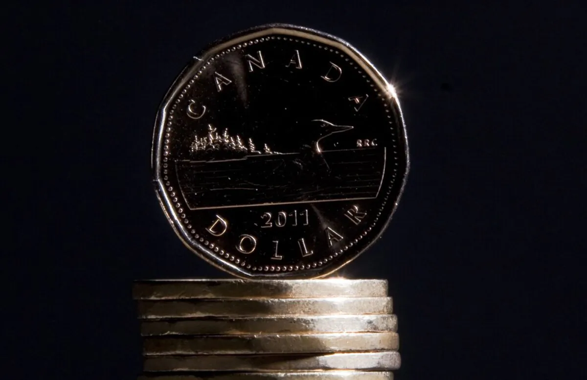 Canadian dollars are pictured in Vancouver on Sept. 22, 2011. (The Canadian Press/Jonathan Hayward)