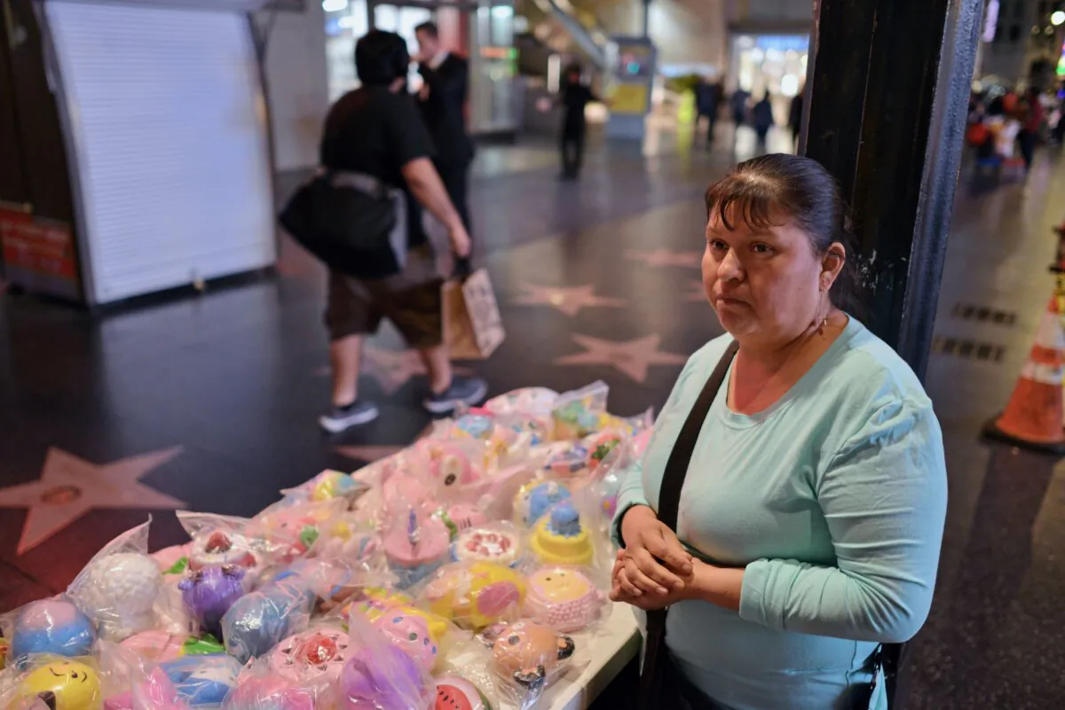 Godulia Portillo sells squishy toys in front of the Dolby Theatre on the Hollywood Walk of Fame, Los Angeles on March 18, 2019. (Agustin Paullier/AFP via Getty Images)