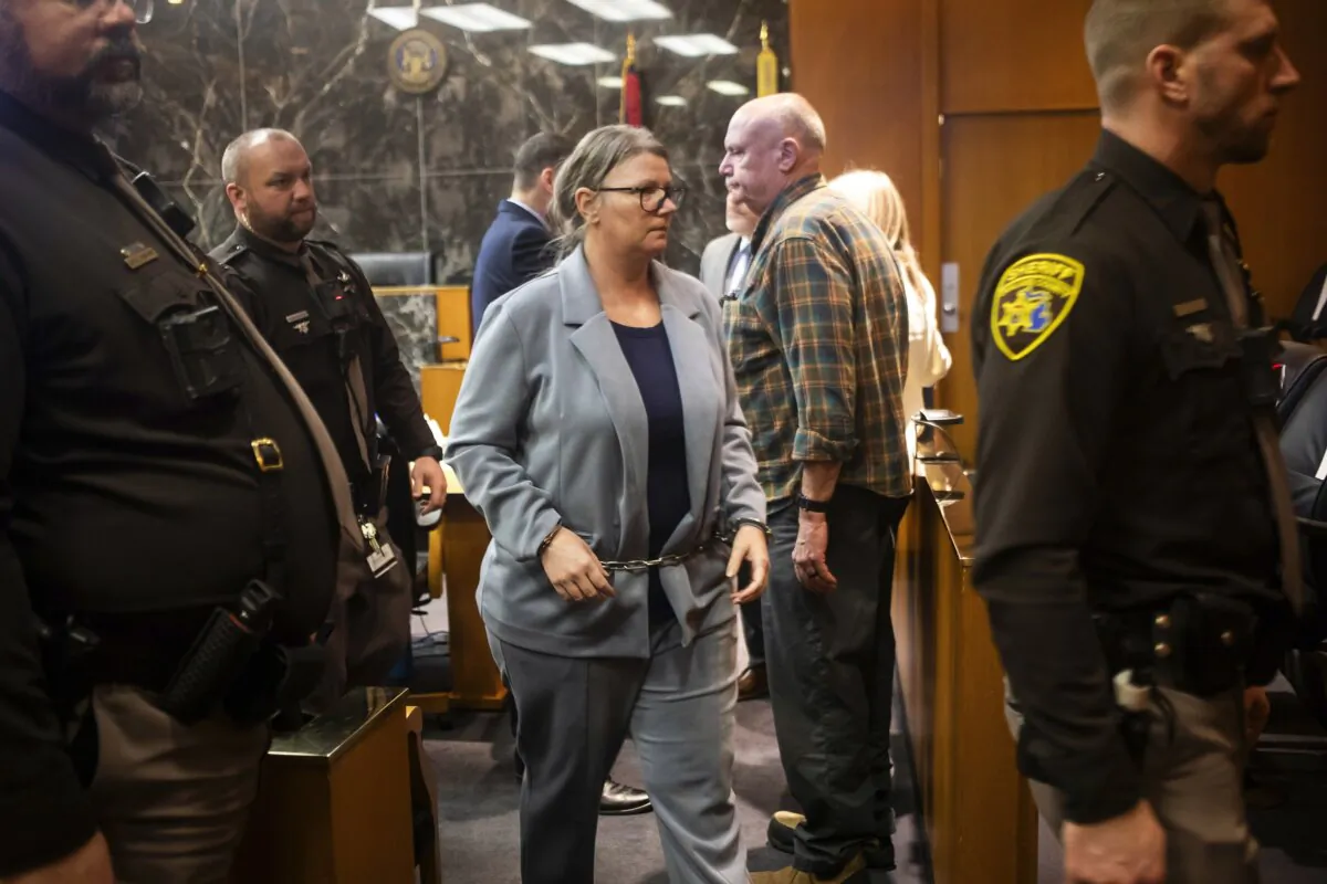 Defendant Jennifer Crumbley exits the courtroom during her jury trial at the Oakland County Courthouse in Pontiac, Mich., on Jan. 31, 2024. (Katy Kildee/Detroit News via AP, Pool)