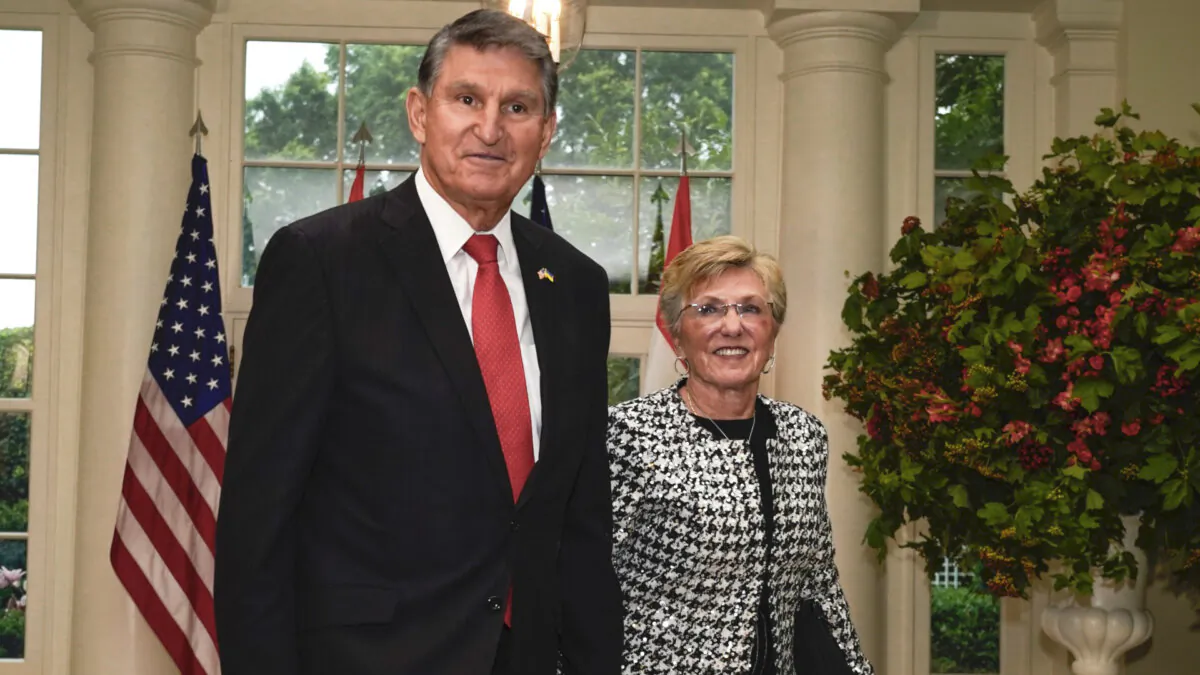 Sen. Joe Manchin (D-W.Va.) and his wife, Gayle Manchin, arrive for the State Dinner with President Joe Biden and India's Prime Minister Narendra Modi at the White House in Washington on June 22, 2023. (Jacquelyn Martin/AP Photo)