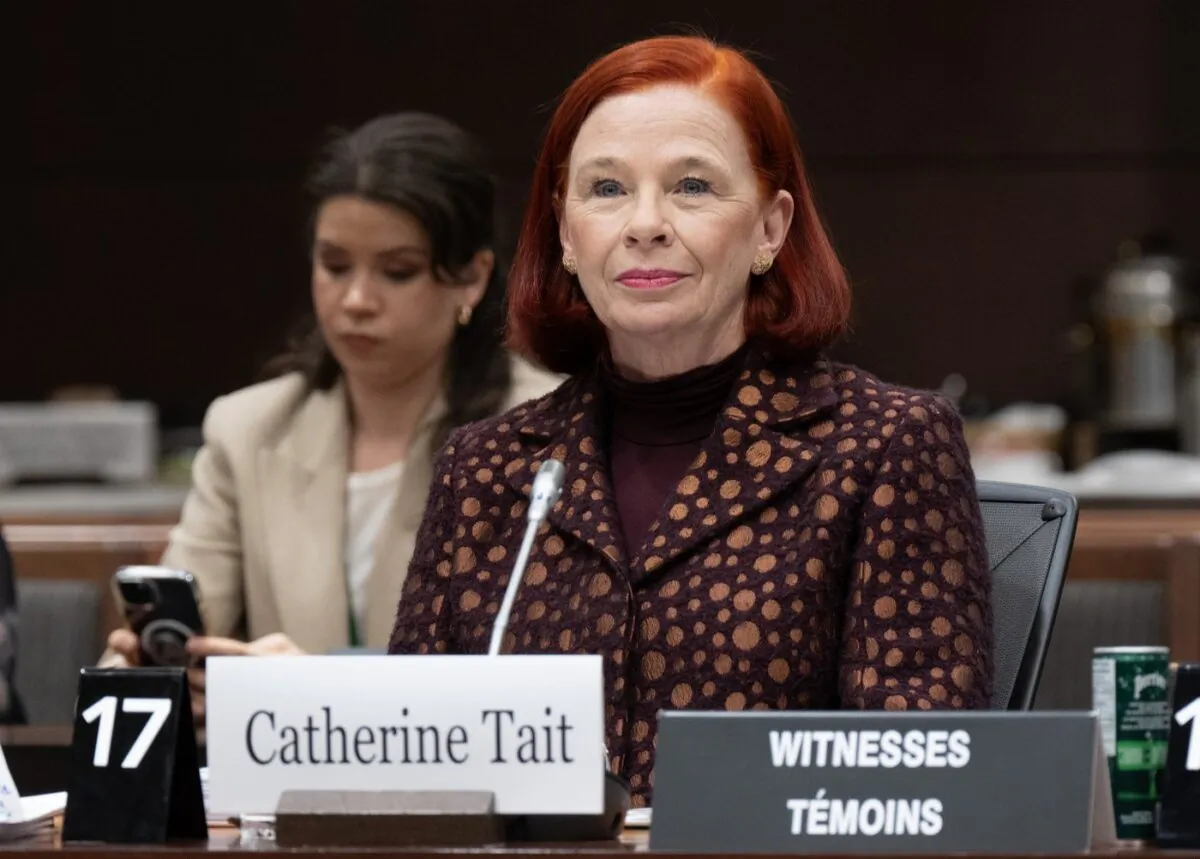 CBC/Radio-Canada president and chief executive Catherine Tait waits to testify before a House of Commons committee in Ottawa, on Jan. 30, 2024. (The Canadian Press/Adrian Wyld)