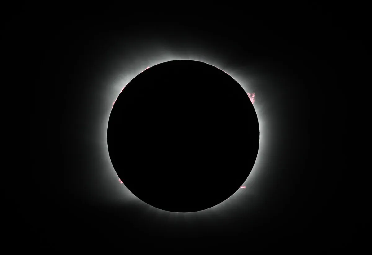 The moon covers the sun during a solar eclipse in Piedra del Aguila, Argentina, on Dec. 14, 2020. (Natacha Pisarenko/AP Photo)