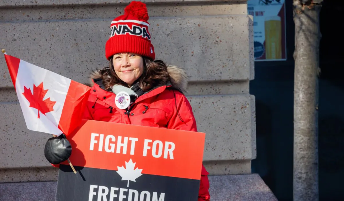 The Freedom Convoy and their supporters occupy the streets of Ottawa to protest vaccine mandates, in Ottawa, on Feb. 5, 2022. (Christopher O'Donnell/Shutterstock)