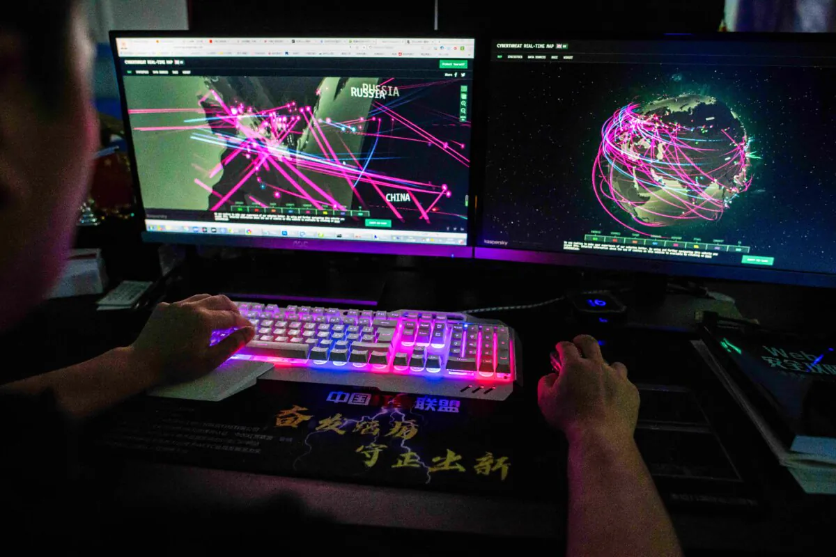 A hacker uses his computer in Dongguan, China's southern Guangdong Province, on Aug. 4, 2020. (Nicolas Asfouri/AFP via Getty Images)