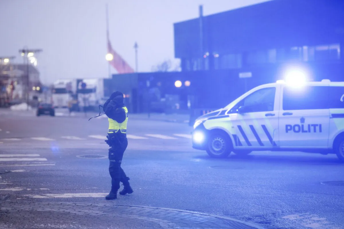 A police officer in the center of Bodø, Northern Norway, on Feb. 1, 2024, during extreme weather. (Per-Inge Johnsen/NTB Scanpix via AP)