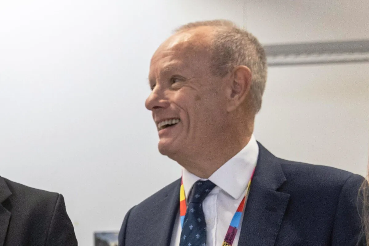 MP Mike Freer talks with pupils in a year 10 art class in Wren academy school in Finchley, London, on Dec. 14, 2023. (Richard Pohle - WPA Pool/Getty Images)