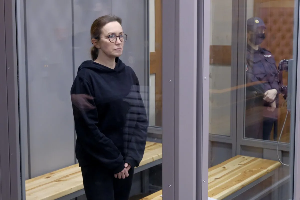 Radio Free Europe-Radio Liberty's editor Alsu Kurmasheva stands in a glass cage in a courtroom in Kazan, Russia, on Feb. 1, 2024. (Vladislav Mikhnevskii/AP Photo)