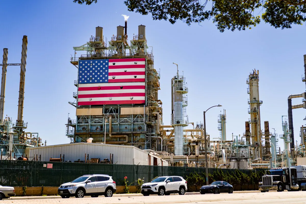 An oil refinery displays an American flag in Wilmington, Calif., on Sept. 21, 2022. (Allison Dinner/Getty Images)