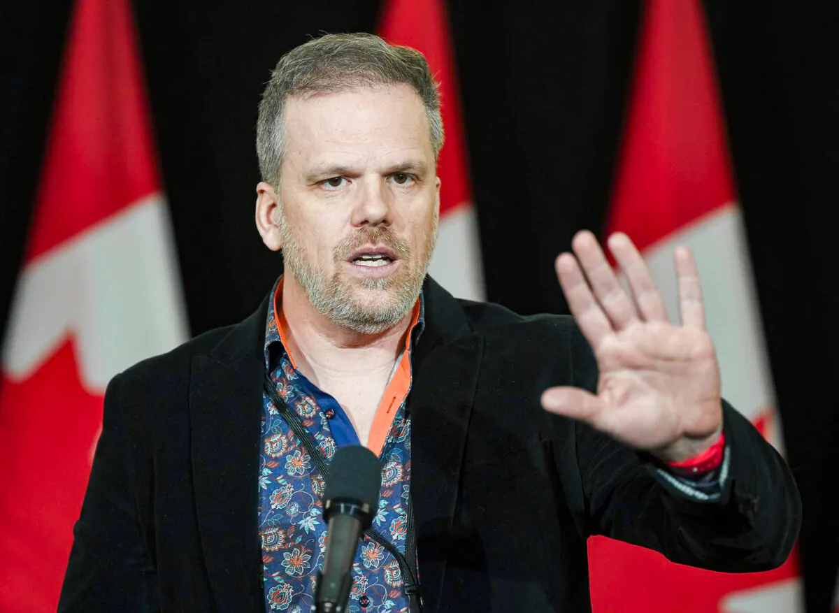 Minister of Health Mark Holland speaks to the media during the federal cabinet retreat in Montreal, on Jan. 22, 2024. (The Canadian Press/Christinne Muschi)