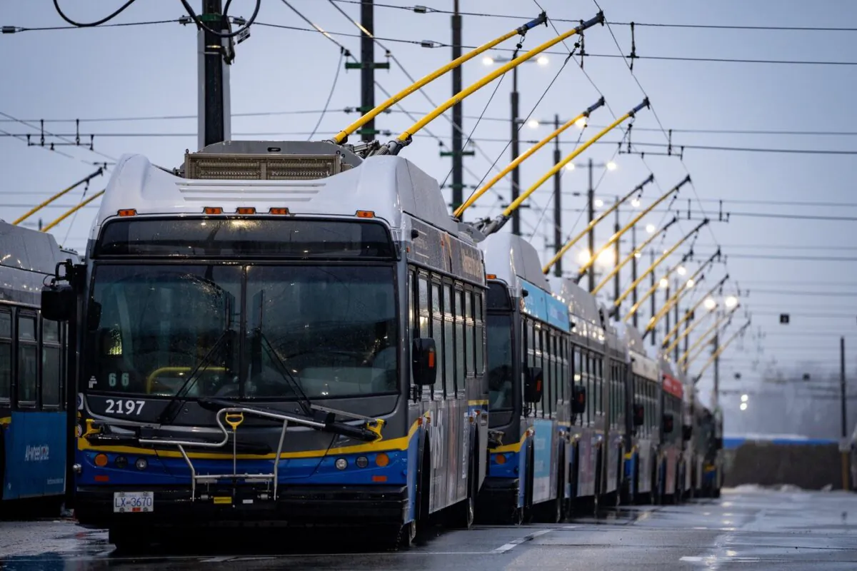 Buses line the Vancouver Transit Centre as transit workers from the Canadian Union of Public Employees Local 4500 strike in Vancouver on Jan. 22, 2024. (The Canadian Press/Ethan Cairns)