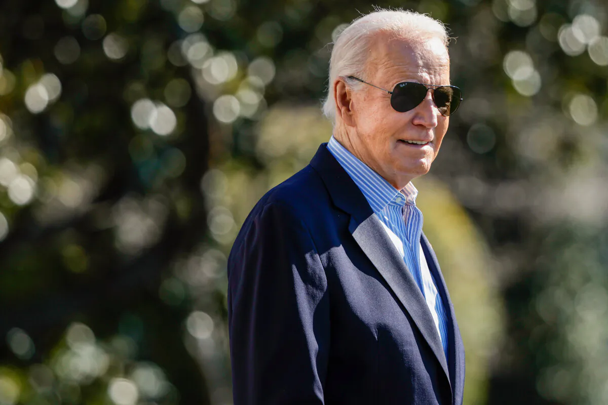 President Joe Biden walks across the South Lawn before boarding the Marine One presidential helicopter and departing the White House in Washington on Feb. 29, 2024. (Chip Somodevilla/Getty Images)