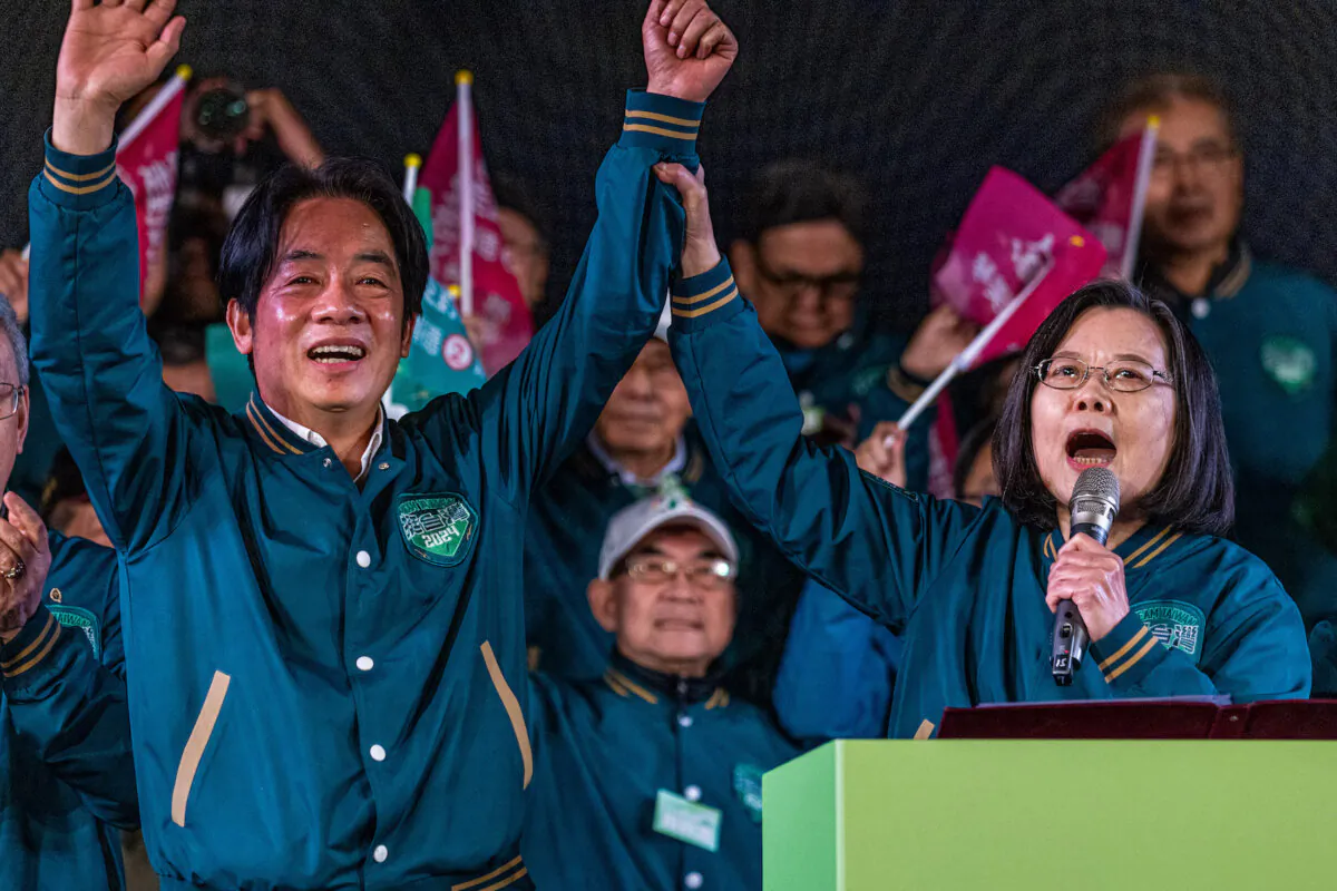 Democratic Progressive Party's (DPP) presidential candidate, Lai Ching-te (L), and Taiwan's president, Tsai Ing-wen (R), cheer at the end of the campaign rally in Taipei City, Taiwan on Jan. 11, 2024. (Annabelle Chih/Getty Images)