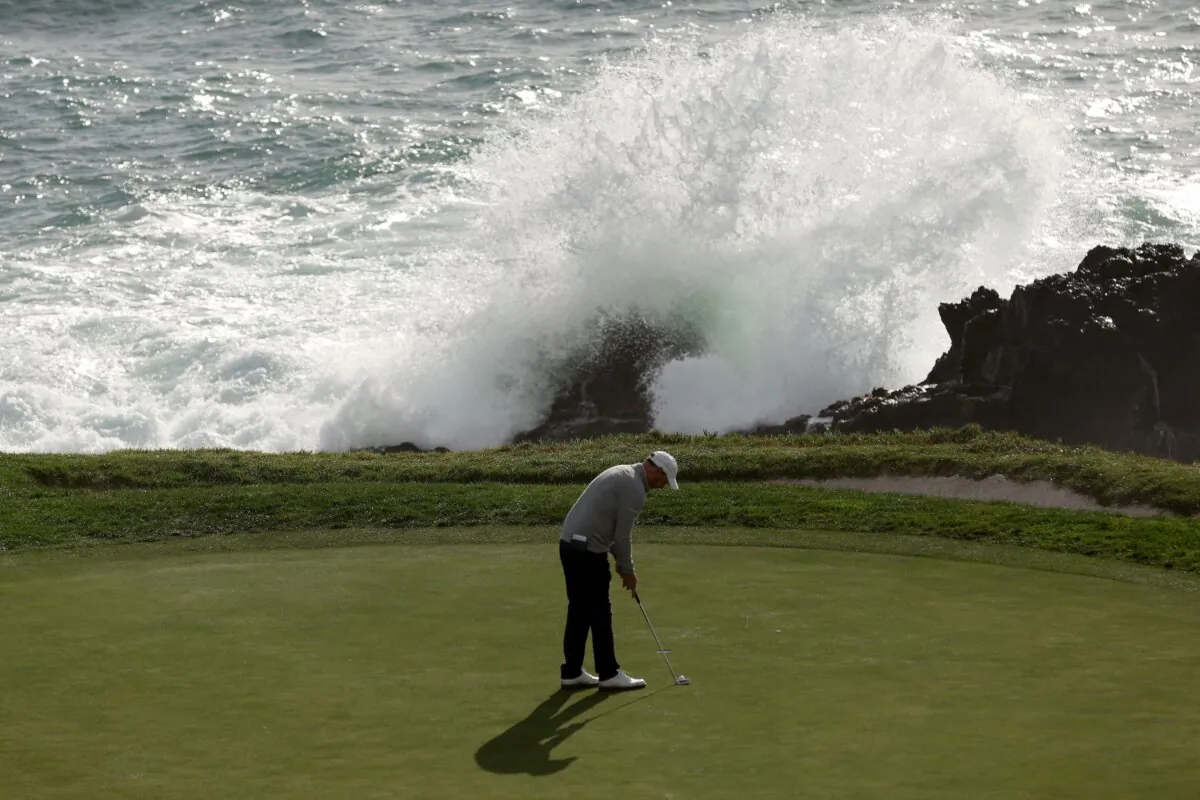 Amateur Philip McCrorie putts on the seventh green during the first round of the Pebble Beach Pro-Am at Pebble Beach Golf Links in Pebble Beach, Calif., on Feb. 1, 2024. (Ezra Shaw/Getty Images)