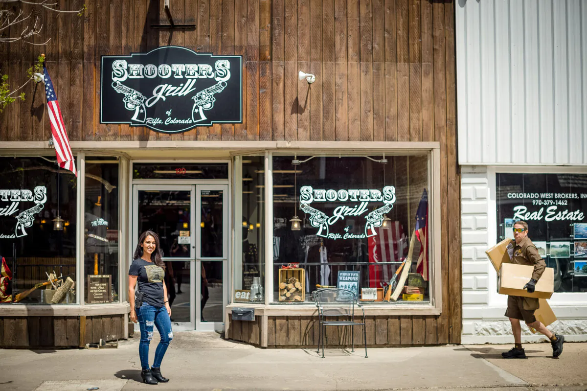 Rep. Lauren Boebert (R-Colo.), who is no. 1 on Democrats’ Congressional “must go” list, stands outside the Shooters Grill in Rifle, Colorado.
(Emily Kask/AFP via Getty Images)