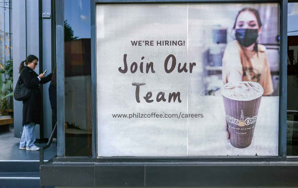 A 'Join Our Team' sign is posted outside a coffee shop in Los Angeles, Calif., on Jan. 3, 2024. (Mario Tama/Getty Images)
