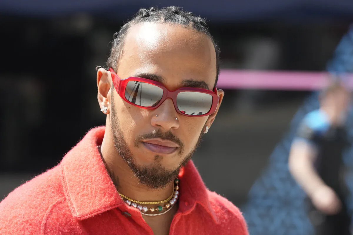 Mercedes driver Lewis Hamilton of Britain arrives at the Bahrain International Circuit in Sakhir, Bahrain, on March 2, 2023. (Frank Augstein/AP Photo)
