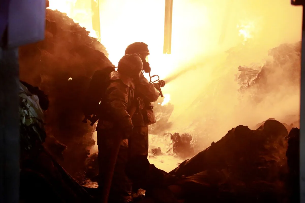 Firefighters put off a fire caused by an explosion at an industrial building in Nairobi, Kenya, on Feb. 2, 2024. (AP Photo)