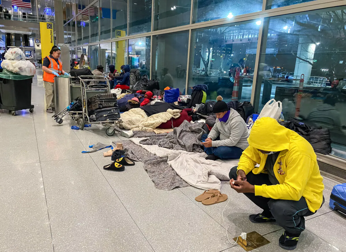 People take shelter at Boston Logan International Airport in this undated photo. (Alice Giordano/The Epoch Times)