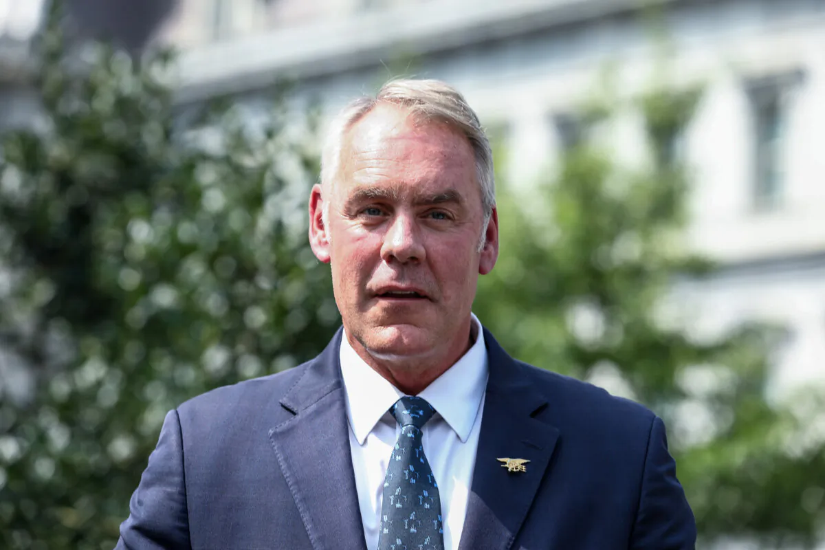 Then-Secretary of the Interior Ryan Zinke speaks to reporters outside the West Wing of the White House in Washington on Aug. 16, 2018. (Samira Bouaou/The Epoch Times)