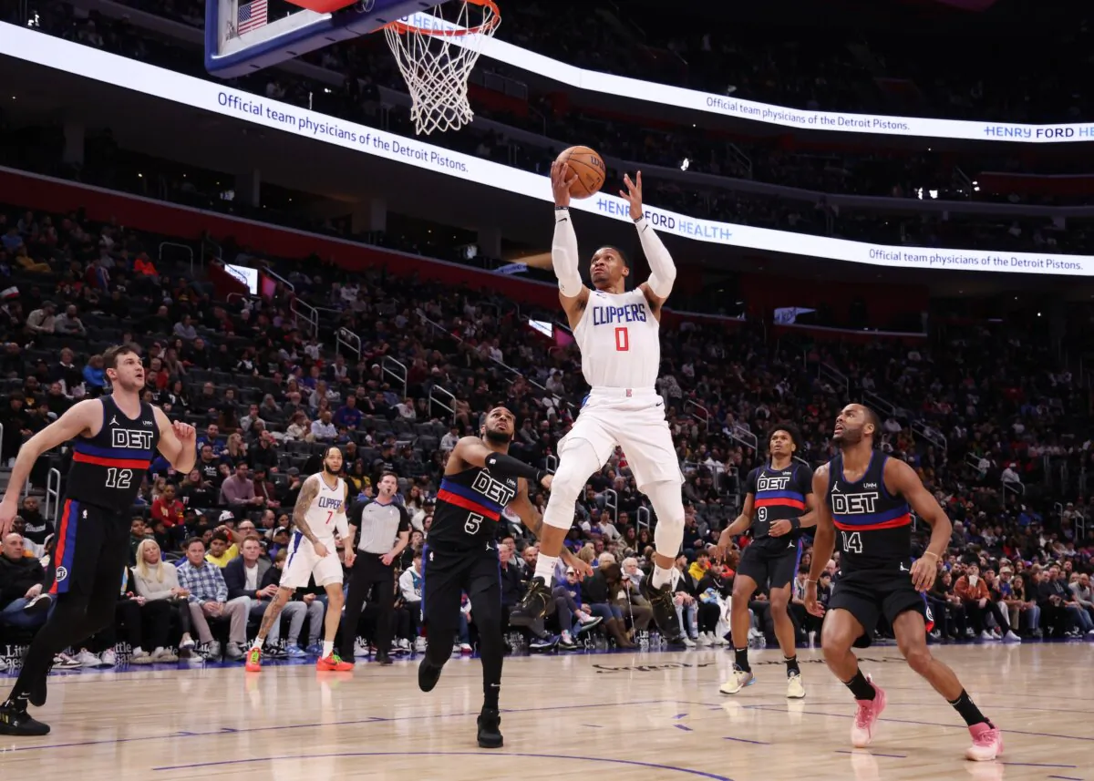 Russell Westbrook (0) of the LA Clippers drives to the basket against Monte Morris (5) of the Detroit Pistons during the second half  in Detroit on Feb. 2, 2024. (Gregory Shamus/Getty Images)