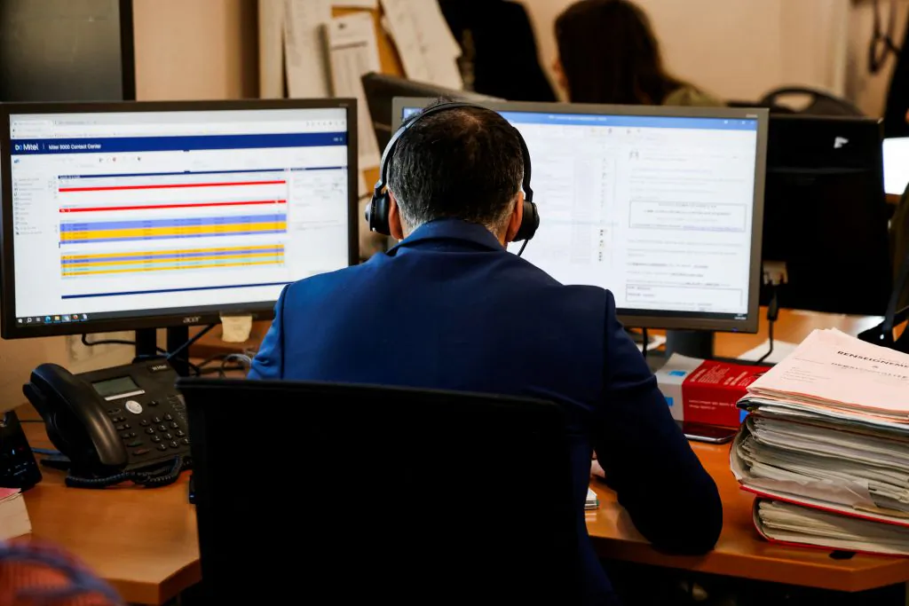 A prosecutor works on the phone with police officers at the prosecution department during an assizes trial hearing in the courthouse of Bobigny, a northeastern Paris suburb, on Jan. 15, 2024. (Ludovic MARIN/AFP via Getty Images)